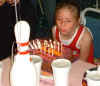 blowing_out_candles_1.JPG (49251 bytes)